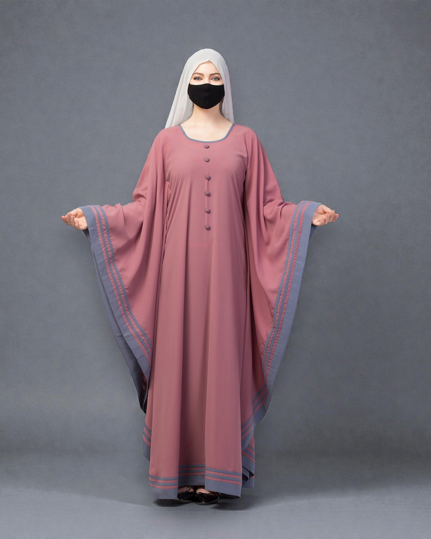 Elegant Kaftan Abaya with contrast striped borders.