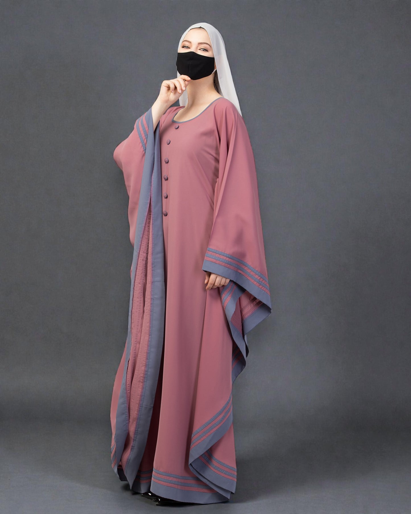 Elegant Kaftan Abaya with contrast striped borders.