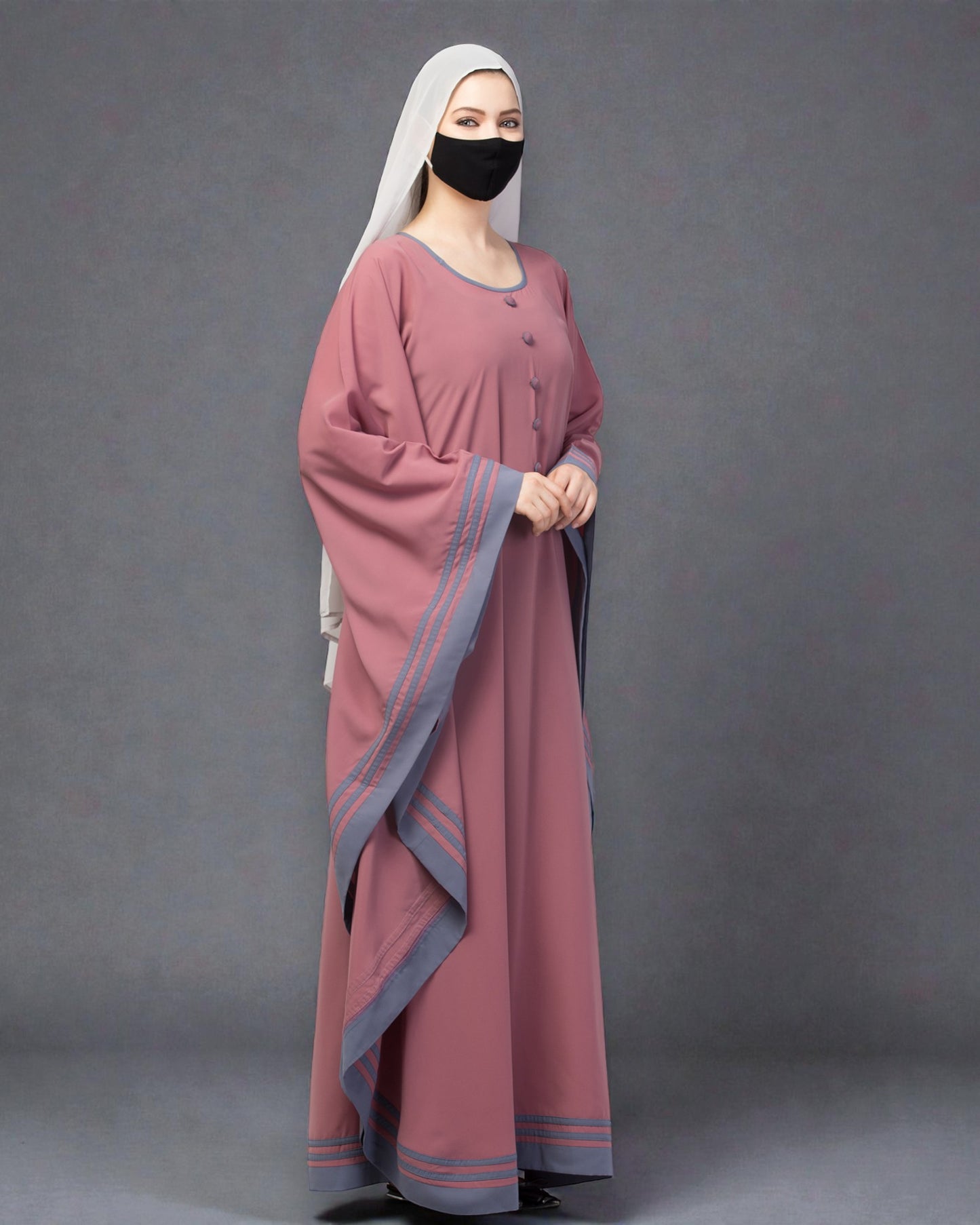 Elegant Kaftan Abaya with contrast striped borders.
