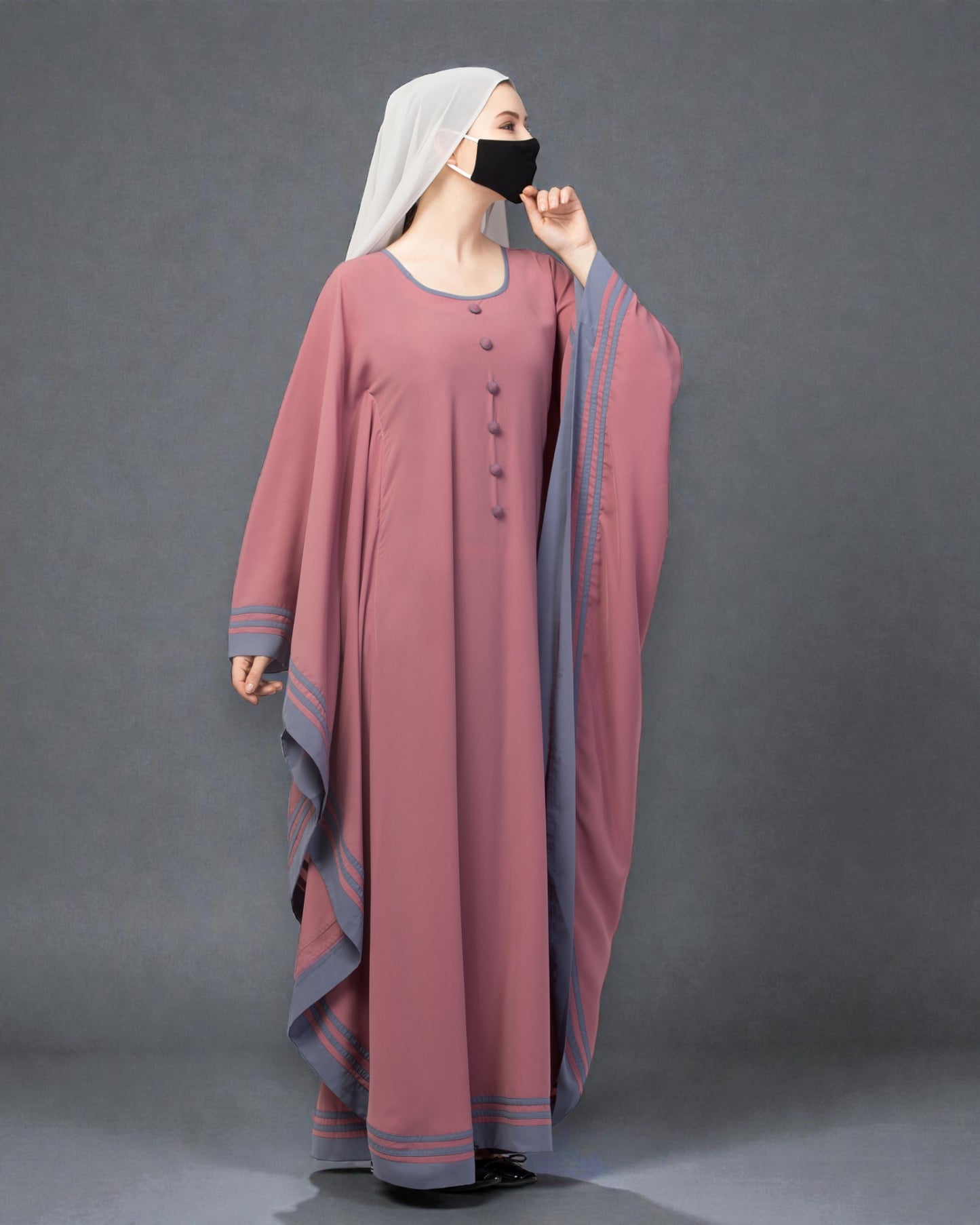 Elegant Kaftan Abaya with contrast striped borders.