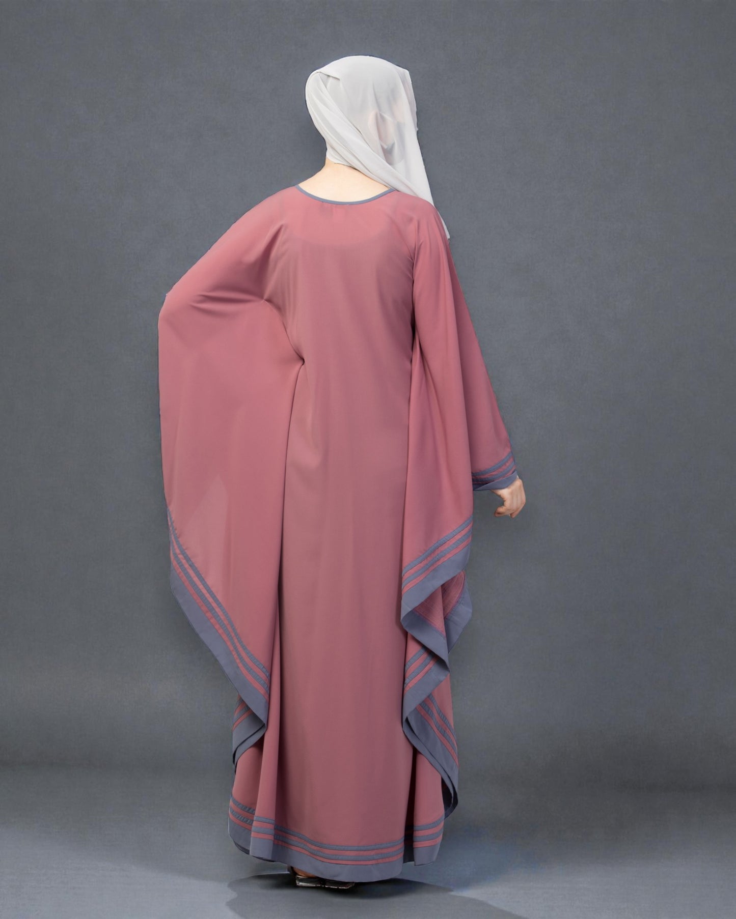 Elegant Kaftan Abaya with contrast striped borders.
