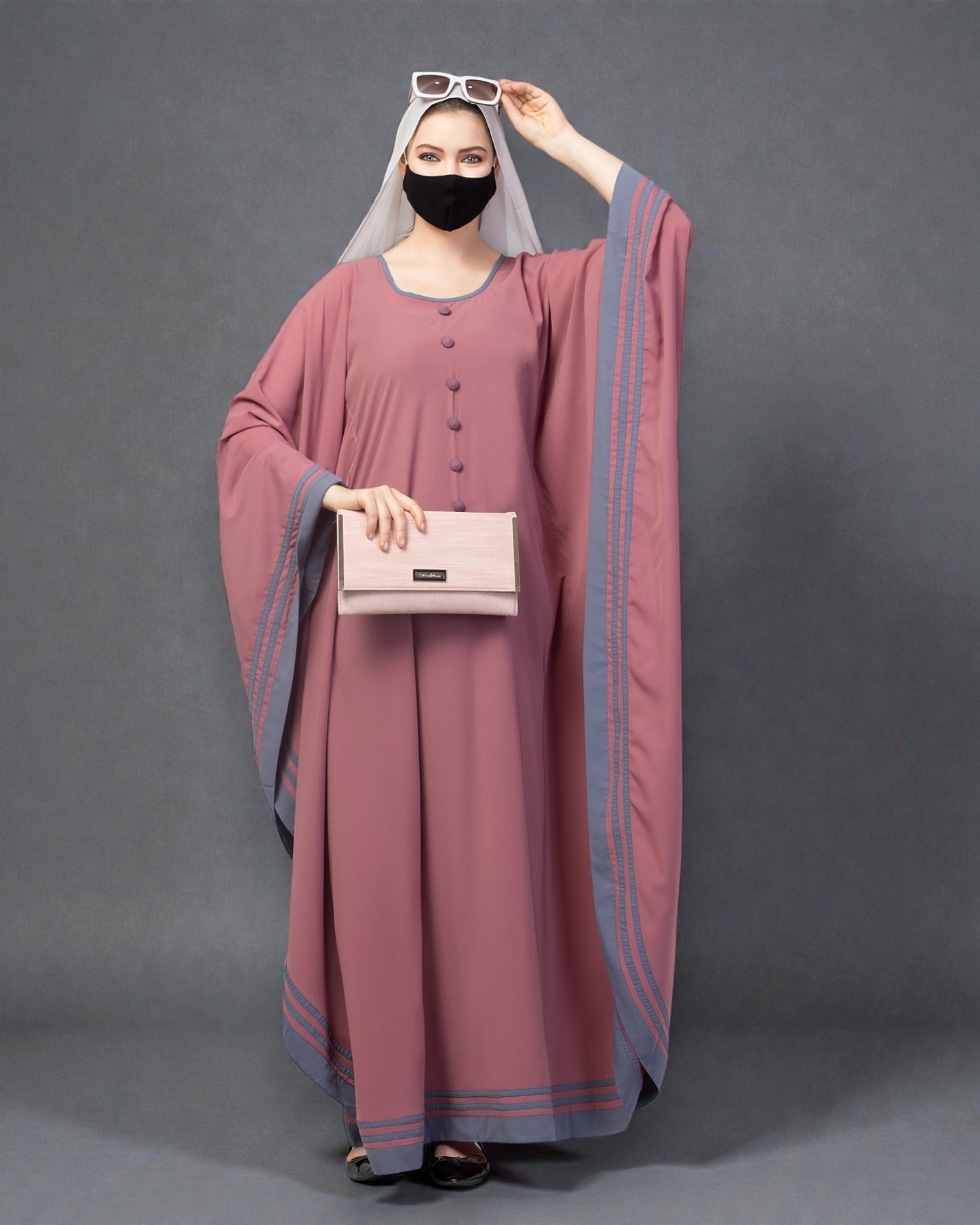 Elegant Kaftan Abaya with contrast striped borders.