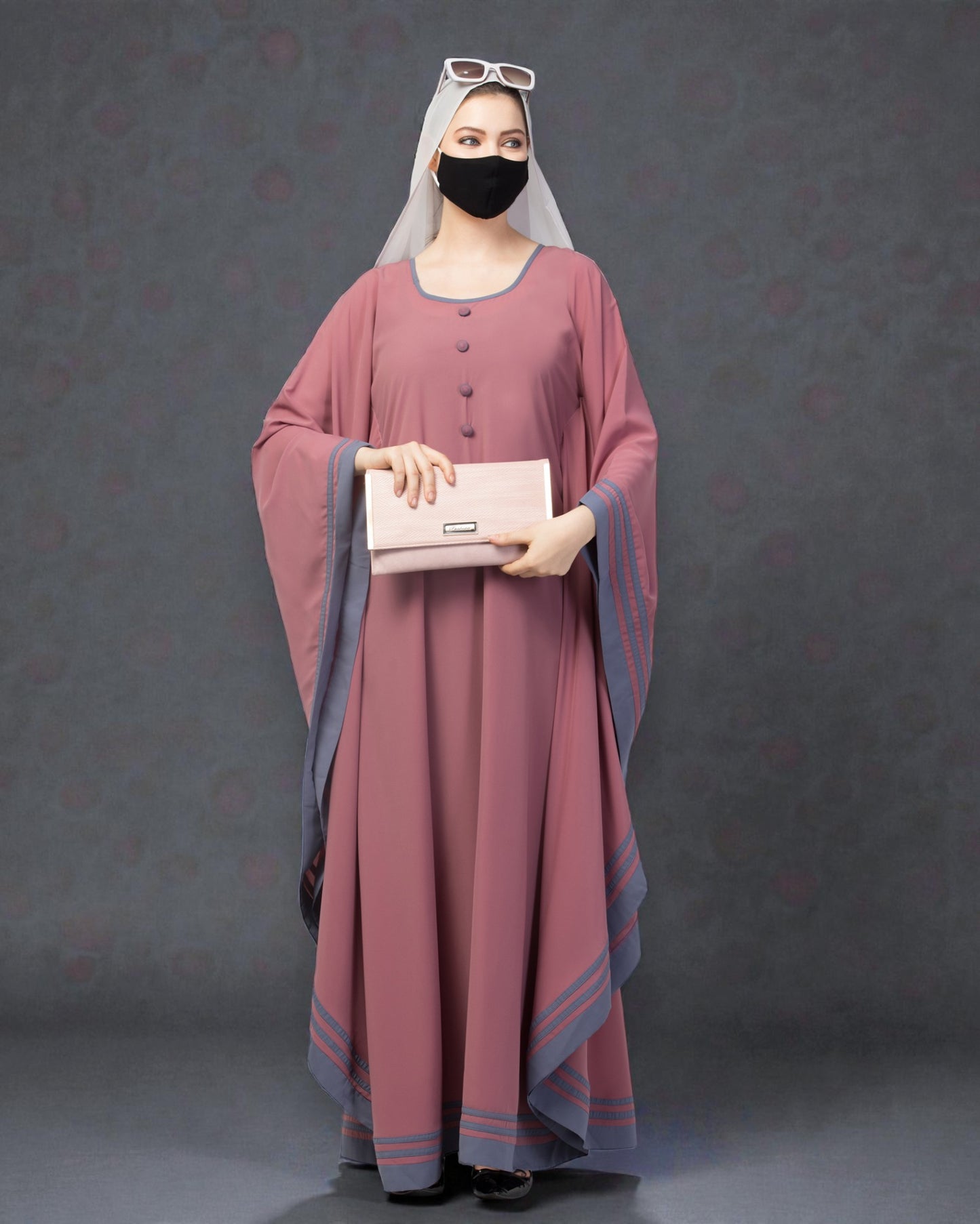 Elegant Kaftan Abaya with contrast striped borders.