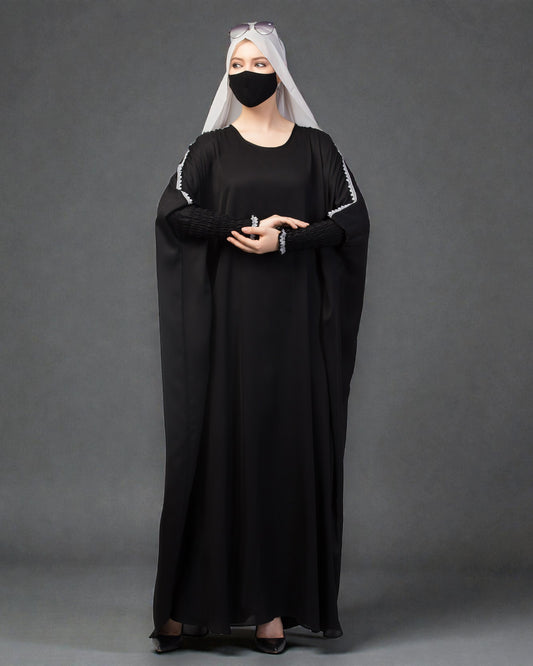 Free Size kaftan with long elasticated sleeves.