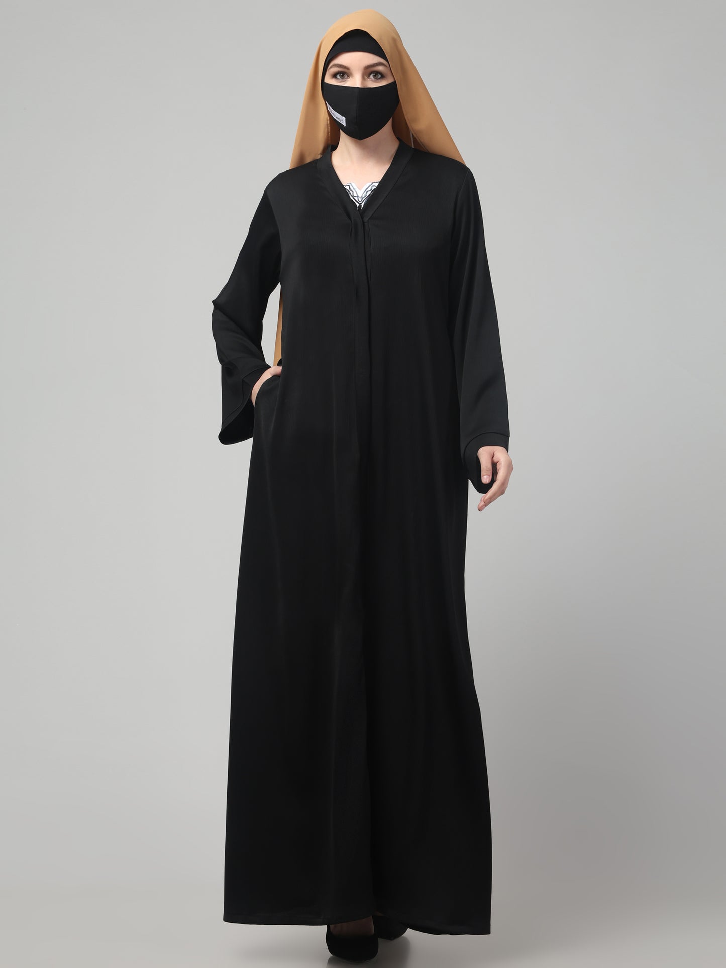 Front Open Abaya In Premium Tiktok Fabric with V-Neck & Flared Sleeves.