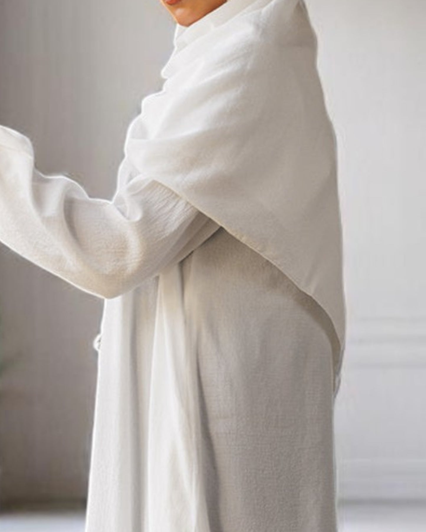 A-Line Closed White Abaya in CYE Crush Fabric with Show Buttons, Wide Sleeves, Pockets & V-Neck
